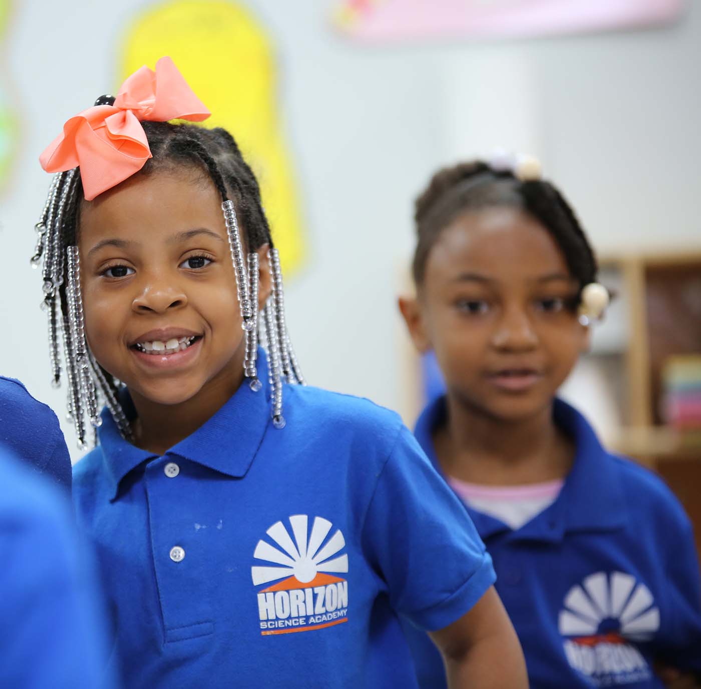 Horizon Science Academy Dayton Elementary student drawing at a desk in a classroom setting